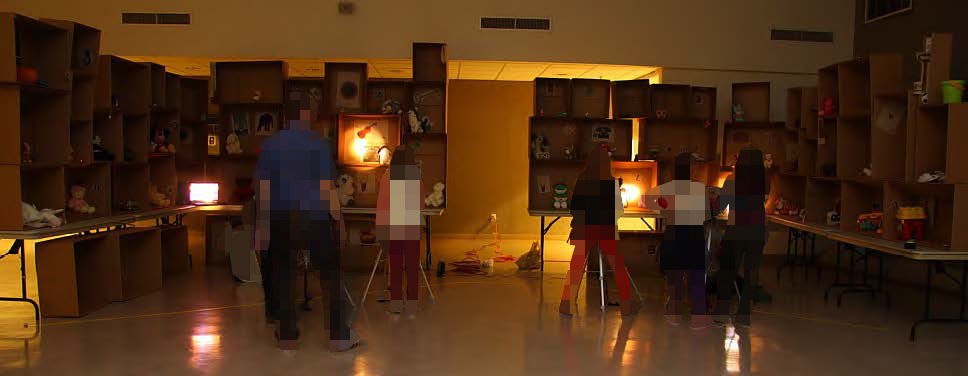 A dark room full of action